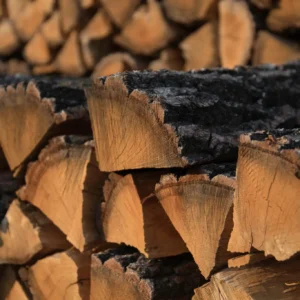 A pile of wood that is stacked on top of each other.